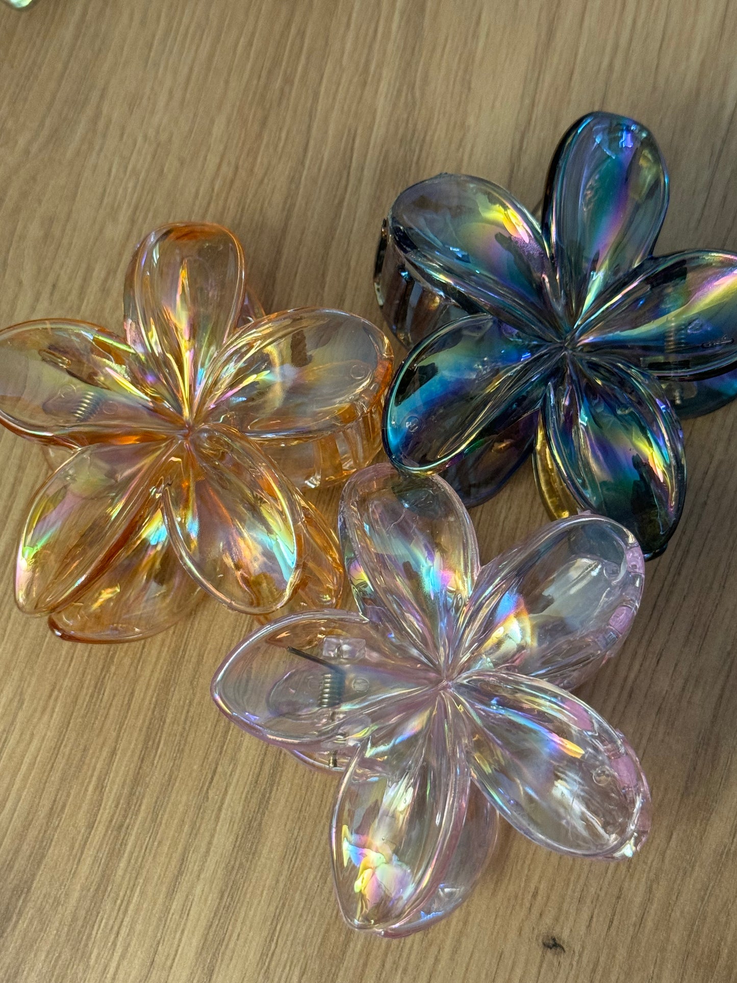 Pince monoï transparente