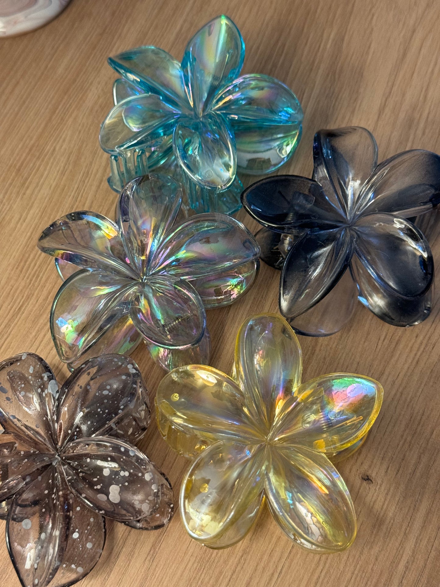 Pince monoï transparente
